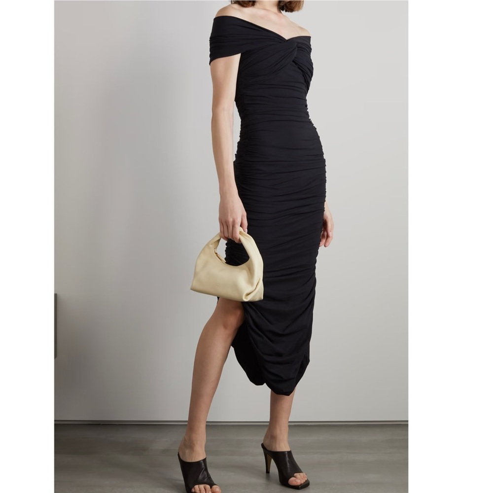 KHAITE Spence ruched fitted off the shoulder midi dress in black